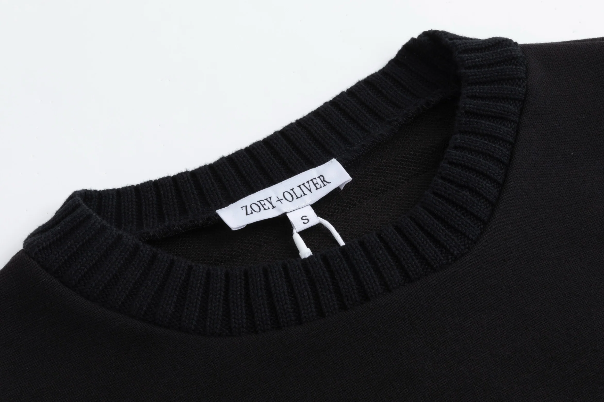 Black Sweater With Green And Blue Knit Pocket Details - Image 6